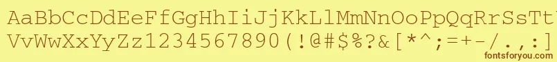 フォントCrr35I – 茶色の文字が黄色の背景にあります。