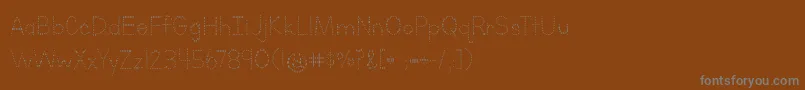 BmdLettersForLearnersDots Font – Gray Fonts on Brown Background