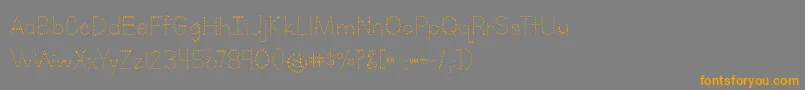 BmdLettersForLearnersDots Font – Orange Fonts on Gray Background
