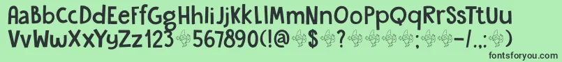 フォントDkGardenGnome – 緑の背景に黒い文字