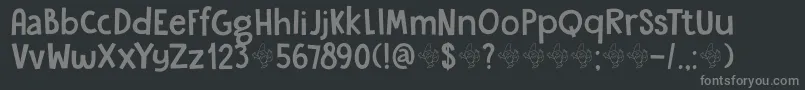 Czcionka DkGardenGnome – szare czcionki na czarnym tle