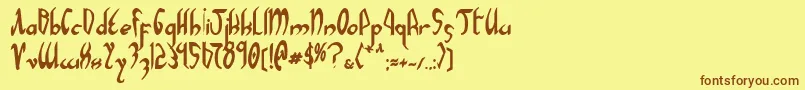 フォントXaphanb – 茶色の文字が黄色の背景にあります。