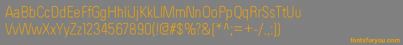 フォントOrderltRegular – オレンジの文字は灰色の背景にあります。