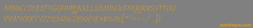 フォントGarineldoscno01 – オレンジの文字は灰色の背景にあります。