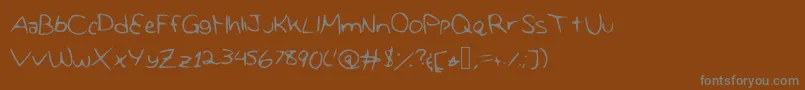 フォントMissedit – 茶色の背景に灰色の文字