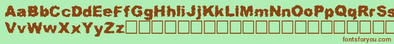 Roadkill Font – Brown Fonts on Green Background