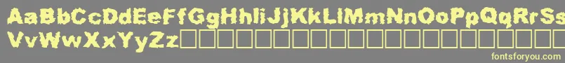 Roadkill Font – Yellow Fonts on Gray Background