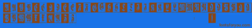 Flourishfraxcaps Font – Brown Fonts on Blue Background