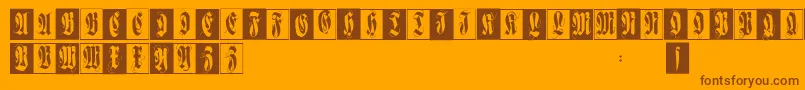 Flourishfraxcaps-Schriftart – Braune Schriften auf orangefarbenem Hintergrund