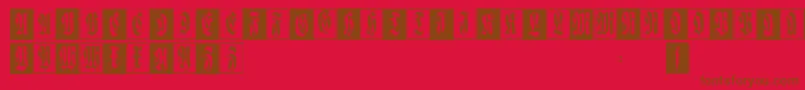 Czcionka Flourishfraxcaps – brązowe czcionki na czerwonym tle