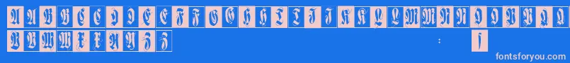 フォントFlourishfraxcaps – ピンクの文字、青い背景
