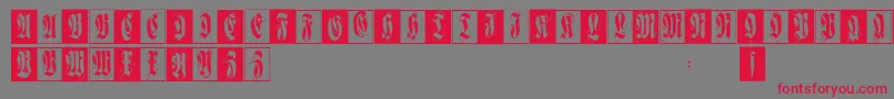 Flourishfraxcaps Font – Red Fonts on Gray Background