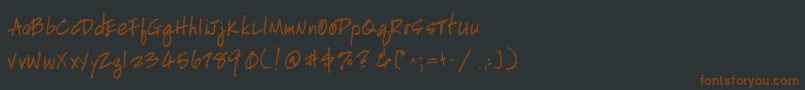 Шрифт HandscriptleftyBold – коричневые шрифты на чёрном фоне
