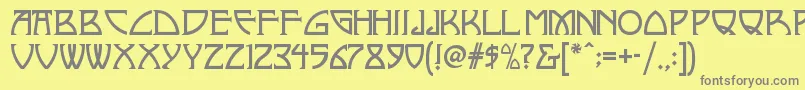 フォントNickleynf – 黄色の背景に灰色の文字