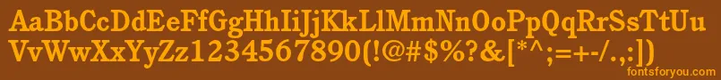 Czcionka CushingstdBold – pomarańczowe czcionki na brązowym tle