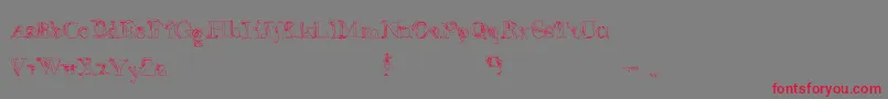 フォントFalseAdvertising – 赤い文字の灰色の背景