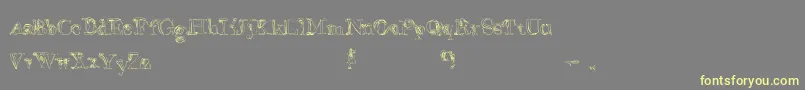 FalseAdvertising Font – Yellow Fonts on Gray Background