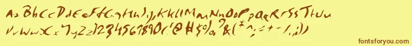 フォントElmoreItalic – 茶色の文字が黄色の背景にあります。