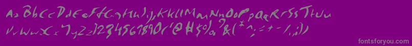 ElmoreItalic-fontti – harmaat kirjasimet violetilla taustalla