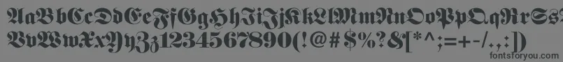 Шрифт Fettefraktur – чёрные шрифты на сером фоне