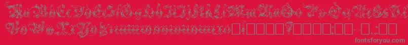 Strelsau-fontti – harmaat kirjasimet punaisella taustalla