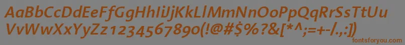 フォントLinotypeAromaSemiboldItalic – 茶色の文字が灰色の背景にあります。