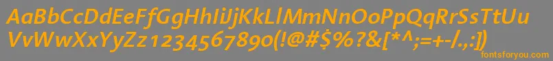 フォントLinotypeAromaSemiboldItalic – オレンジの文字は灰色の背景にあります。
