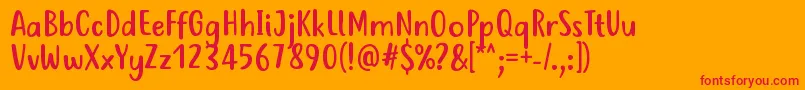 JustTellMeWhatRegular-Schriftart – Rote Schriften auf orangefarbenem Hintergrund