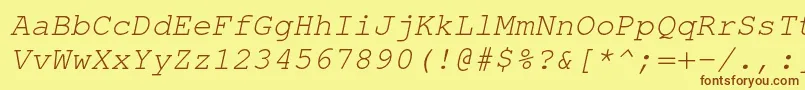 Czcionka TexgyrecursorItalic – brązowe czcionki na żółtym tle