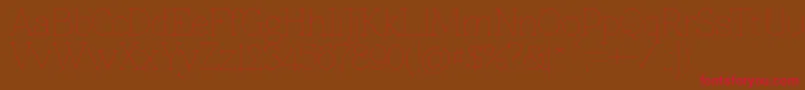 Znikomit Font – Red Fonts on Brown Background