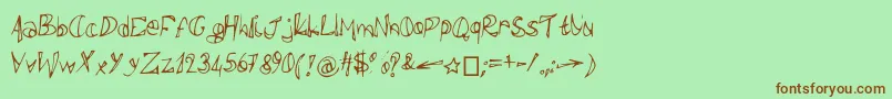 Polissepalisse-Schriftart – Braune Schriften auf grünem Hintergrund