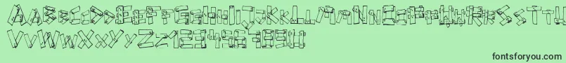 フォントFePlanks – 緑の背景に黒い文字