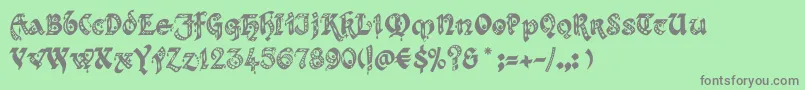 フォントKingthingsgothique – 緑の背景に灰色の文字