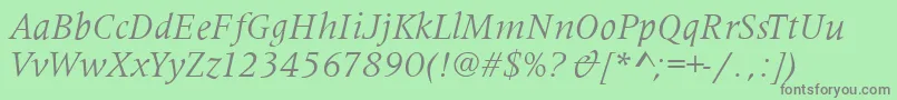 フォントMetaphorItalic – 緑の背景に灰色の文字
