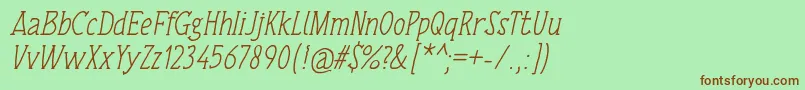 Fonte TulisanTangan74Italic – fontes marrons em um fundo verde