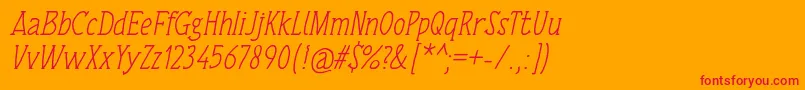 Czcionka TulisanTangan74Italic – czerwone czcionki na pomarańczowym tle
