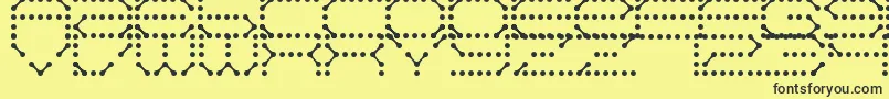 QzTeletype-fontti – mustat fontit keltaisella taustalla
