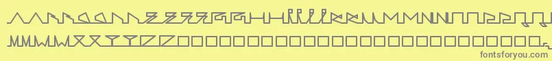 フォントLifeSLines – 黄色の背景に灰色の文字