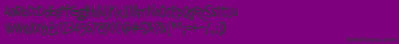 SyntinenIhminenOnKaunisIhminen Font – Black Fonts on Purple Background