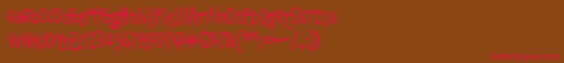 フォントSyntinenIhminenOnKaunisIhminen – 赤い文字が茶色の背景にあります。