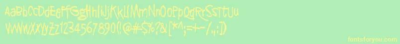 SyntinenIhminenOnKaunisIhminen Font – Yellow Fonts on Green Background