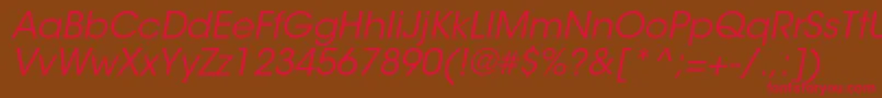 フォントItcavantgardestdBkobl – 赤い文字が茶色の背景にあります。