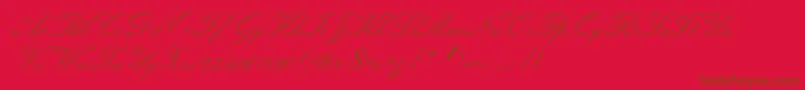 Шрифт Kunstlerschreibschdmed – коричневые шрифты на красном фоне