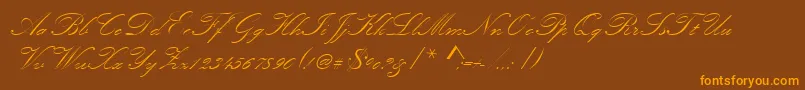 Шрифт Kunstlerschreibschdmed – оранжевые шрифты на коричневом фоне