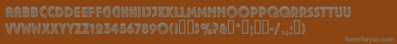 PizzicatoDecorativeRegular-fontti – harmaat kirjasimet ruskealla taustalla