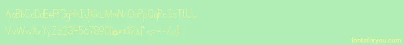 フォントSimplePrint – 黄色の文字が緑の背景にあります