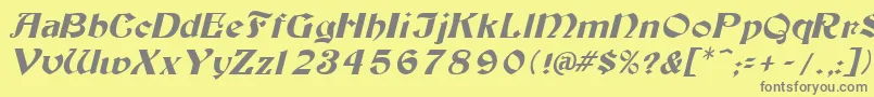 フォントTutburI – 黄色の背景に灰色の文字