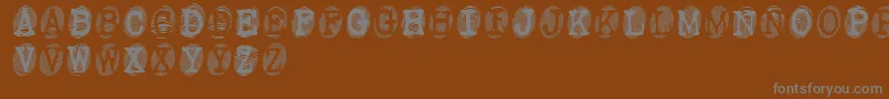 Шрифт Powderfinger – серые шрифты на коричневом фоне