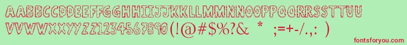AStitchPlusNine Font – Red Fonts on Green Background