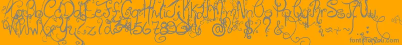 HolidayHome-Schriftart – Graue Schriften auf orangefarbenem Hintergrund